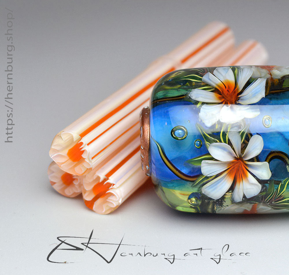 Murini. “White Flower with Fiery Center” Murine Cane – 50 mm stick, COE 104